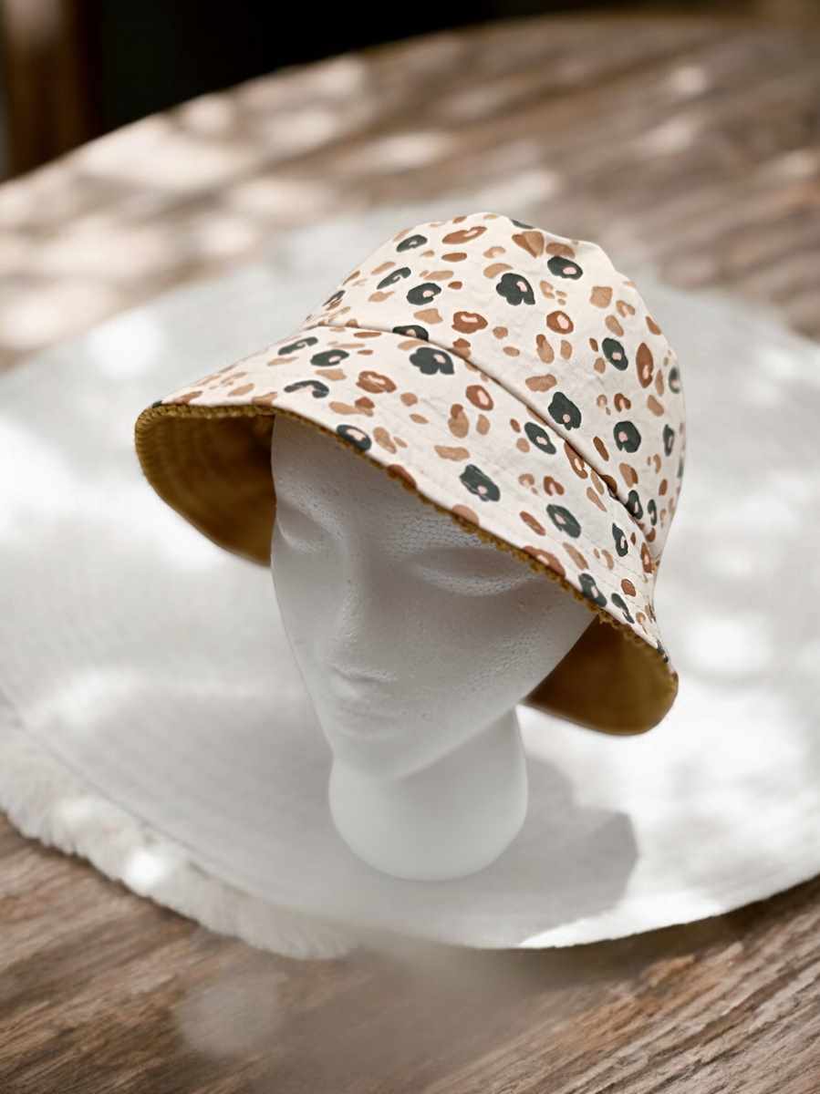 bob réversible en velours et motif léopard